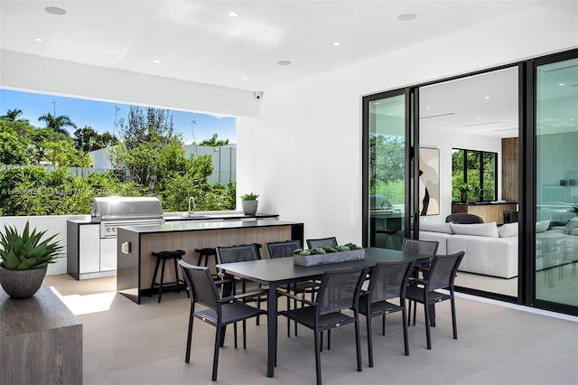 dining space featuring sink