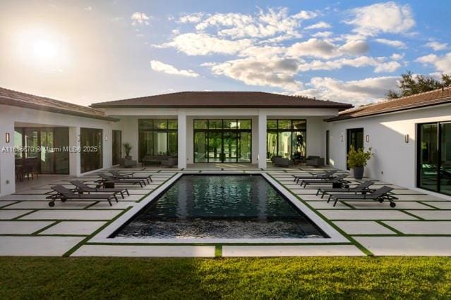 view of pool featuring a patio