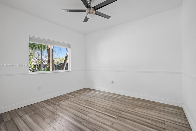 unfurnished room featuring ceiling fan and light hardwood / wood-style floors