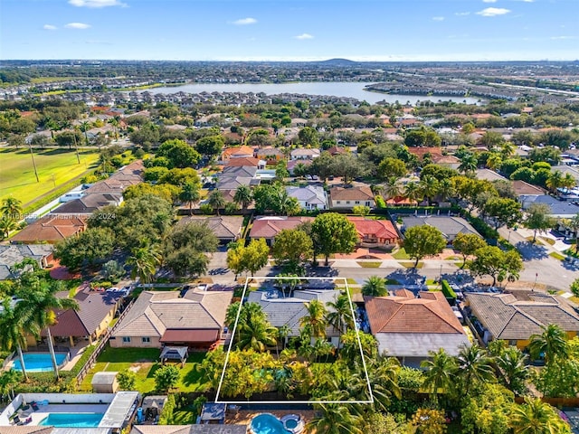 bird's eye view with a water view