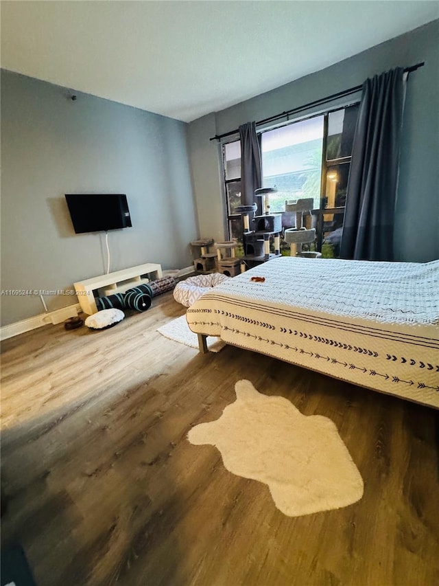 bedroom featuring hardwood / wood-style floors