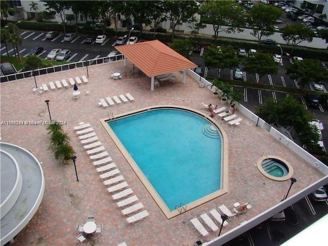 view of swimming pool with a gazebo