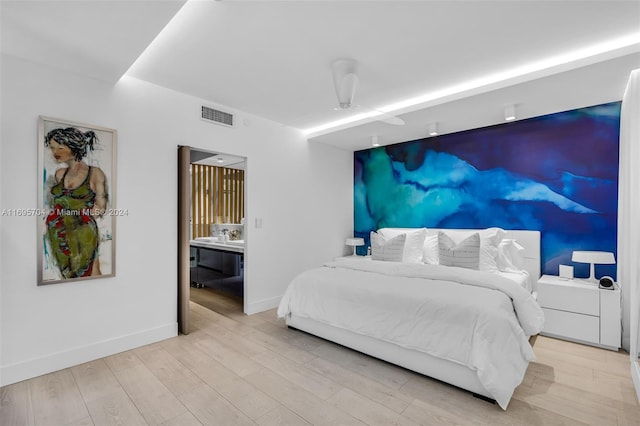 bedroom featuring light hardwood / wood-style flooring