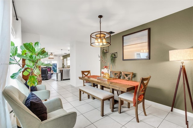 dining area with light tile patterned flooring