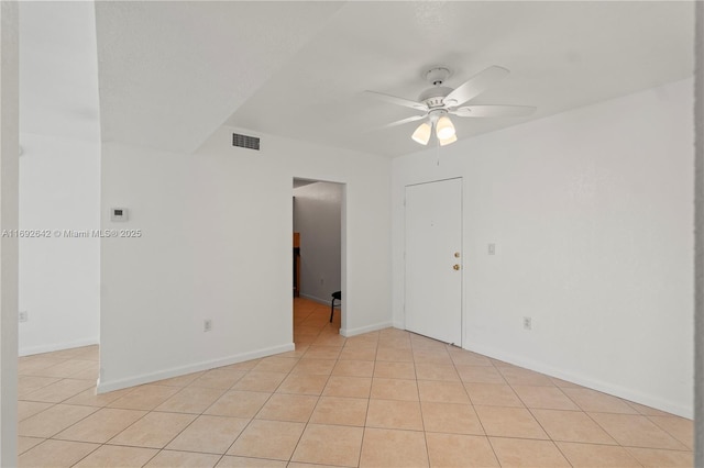 7100 NW 17th St Unit 219, Plantation, FL 33313 - empty room with a ceiling fan, light tile patterned floors, and baseboards