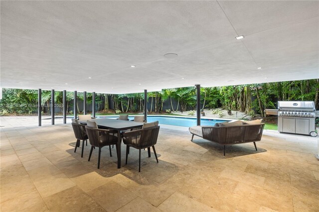 dining space featuring a wall of windows and light hardwood / wood-style flooring