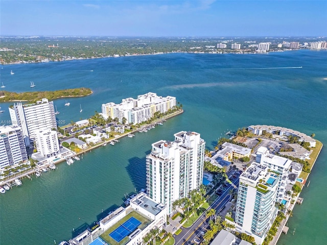 aerial view featuring a view of city and a water view