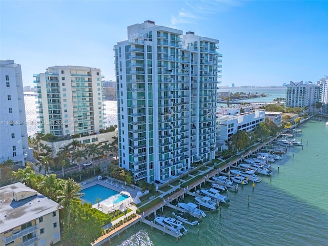 bird's eye view with a water view and a view of city