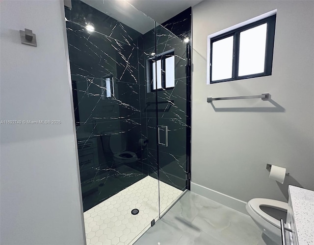 bathroom with toilet and walk in shower