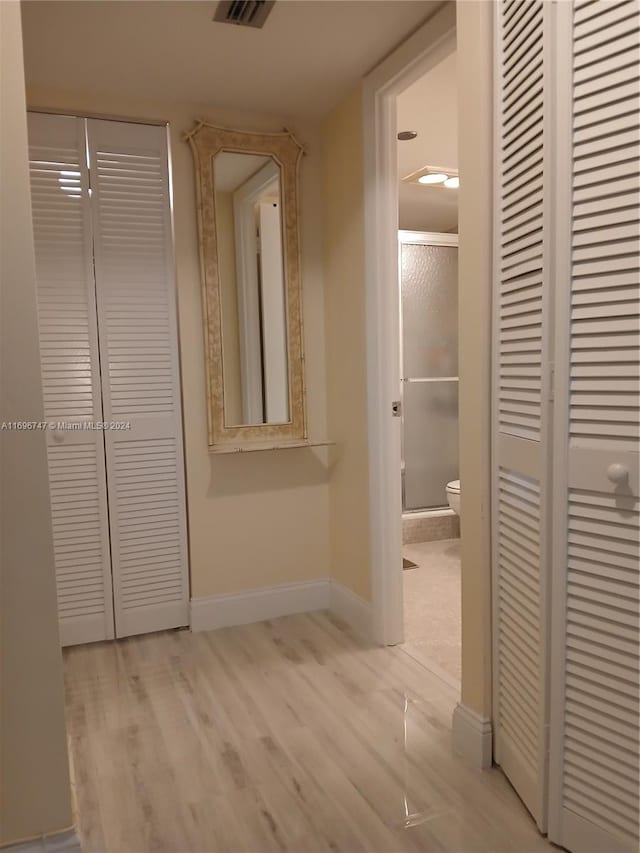 hallway featuring light hardwood / wood-style floors