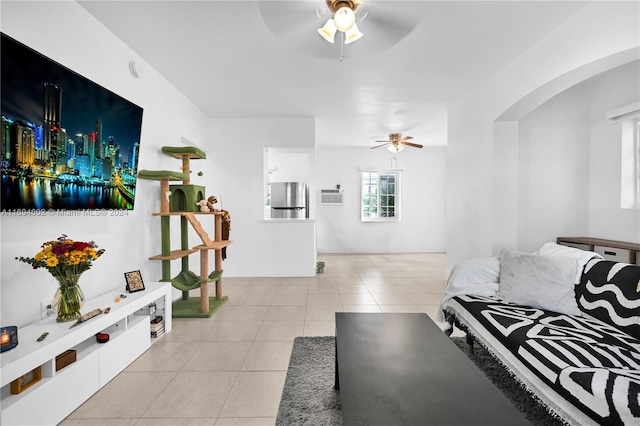 tiled living room featuring a wall mounted air conditioner