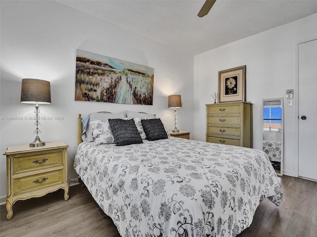 bedroom featuring hardwood / wood-style floors and ceiling fan