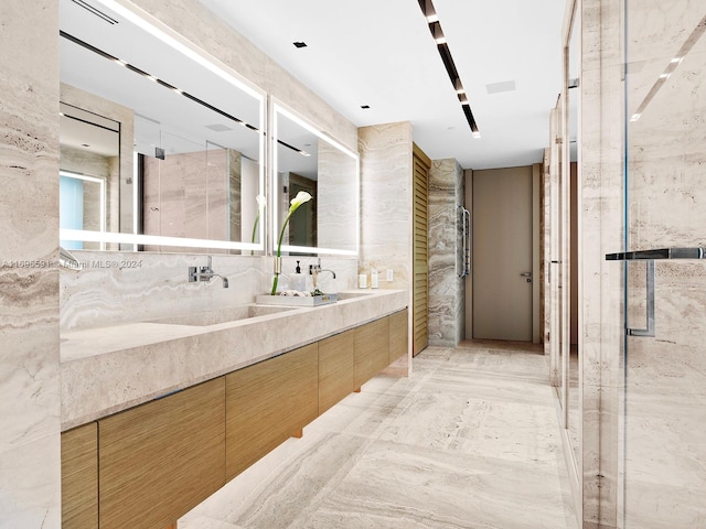 bathroom featuring vanity and walk in shower