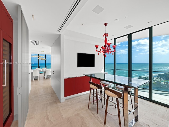 dining space featuring expansive windows