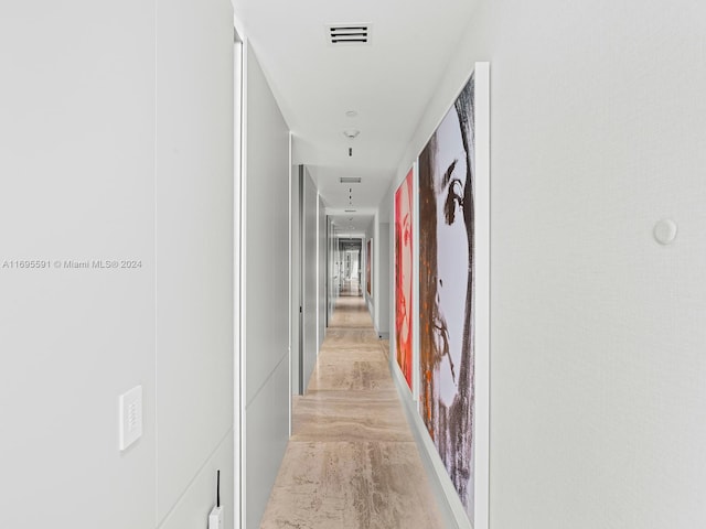 hallway featuring light wood-type flooring