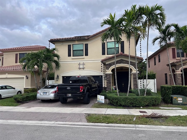 view of front of home with a garage