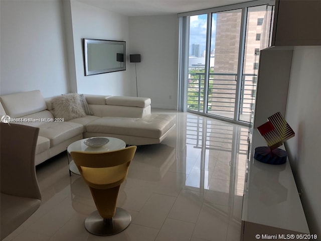 335 S Biscayne Blvd Unit 2202, Miami, FL 33131 - living room with a wall of windows and light tile patterned floors