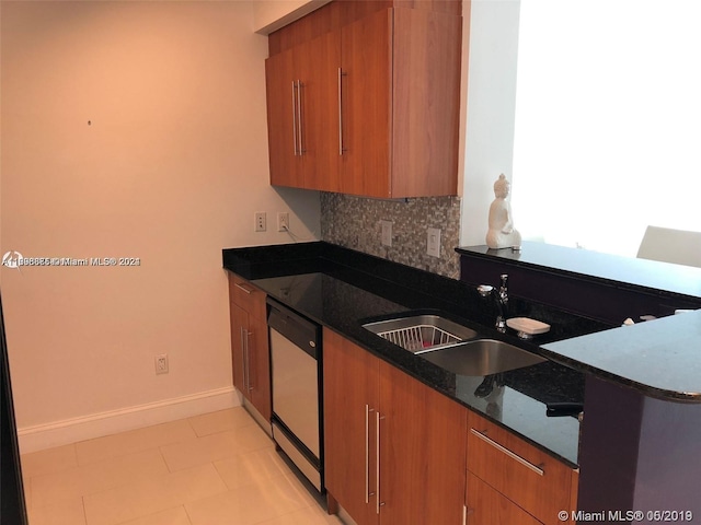 335 S Biscayne Blvd Unit 2202, Miami, FL 33131 - kitchen with dishwasher, brown cabinets, tasteful backsplash, and dark stone countertops