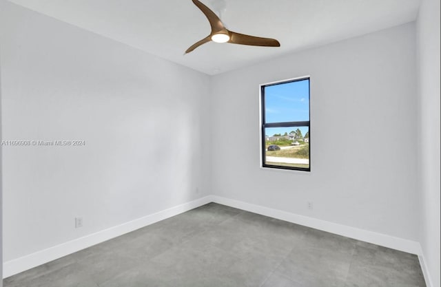 spare room with ceiling fan