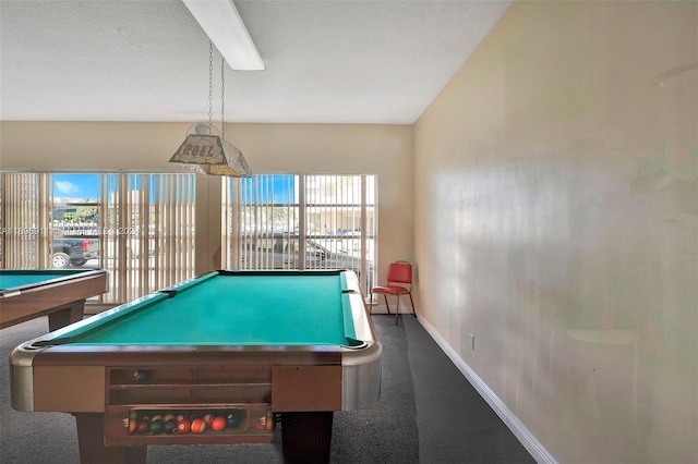 playroom with dark colored carpet, plenty of natural light, and billiards