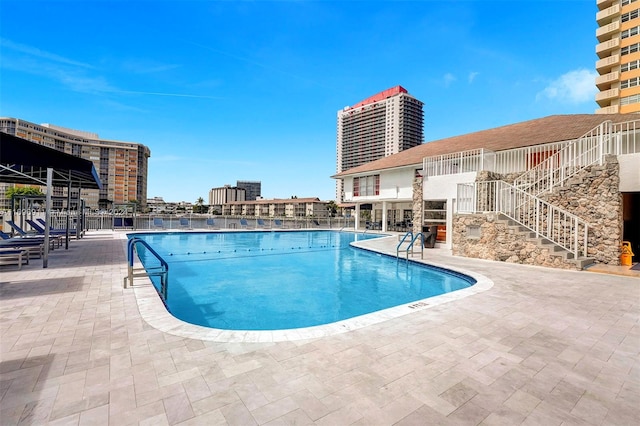 view of pool with a patio area