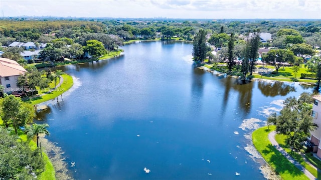 bird's eye view with a water view