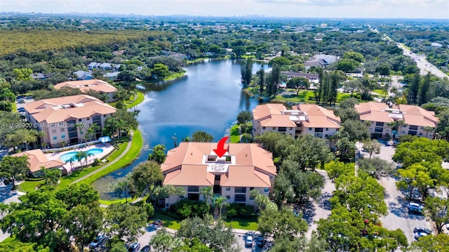 drone / aerial view with a water view