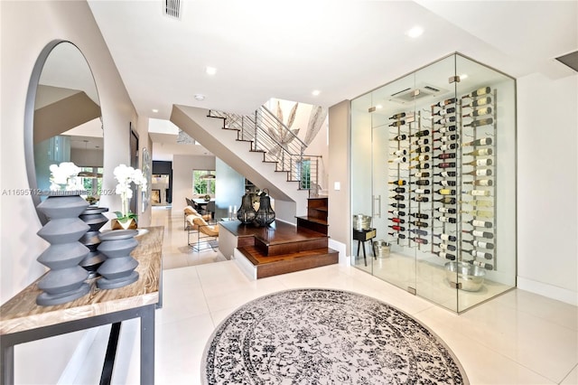 wine area featuring tile patterned floors