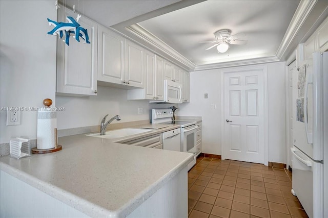 kitchen with kitchen peninsula, white appliances, ceiling fan, light tile patterned floors, and white cabinetry