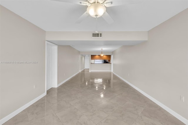 empty room featuring ceiling fan