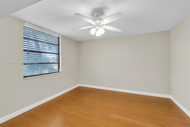 spare room featuring ceiling fan and wood-type flooring