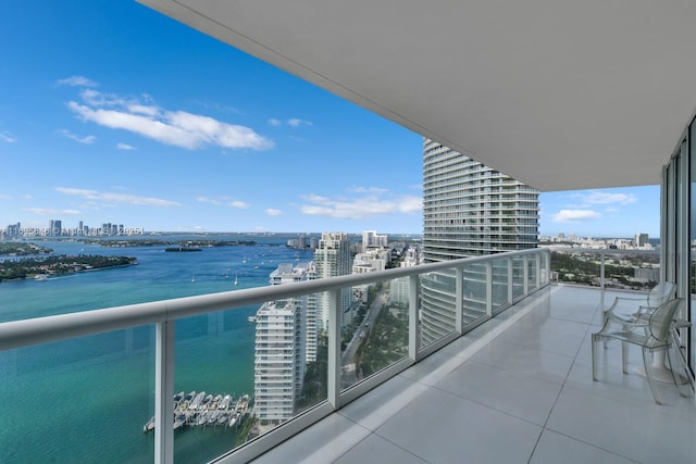 balcony featuring a water view