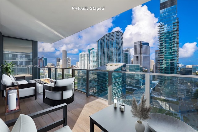 balcony with an outdoor fire pit