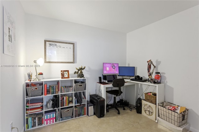 home office featuring light tile patterned flooring