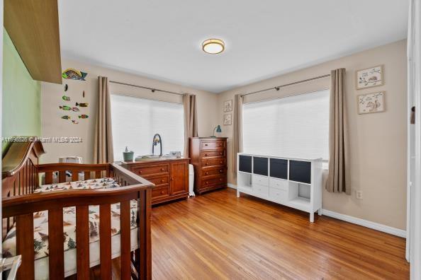 bedroom featuring light hardwood / wood-style flooring