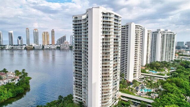 view of building exterior with a water view