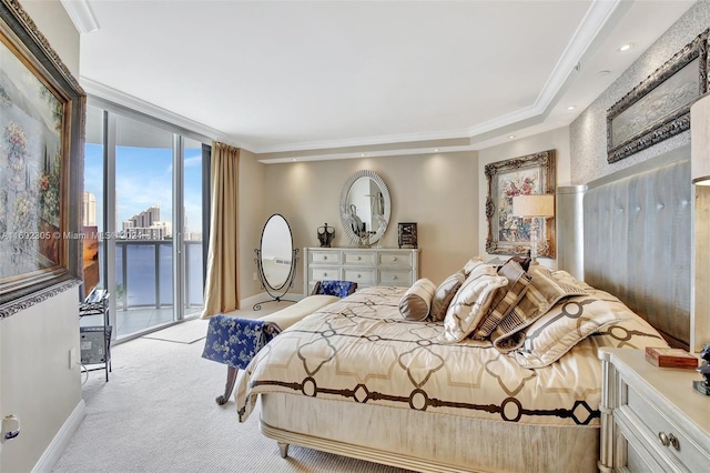 carpeted bedroom with access to exterior, a wall of windows, a water view, and ornamental molding