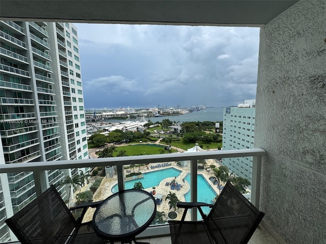 balcony featuring a water view