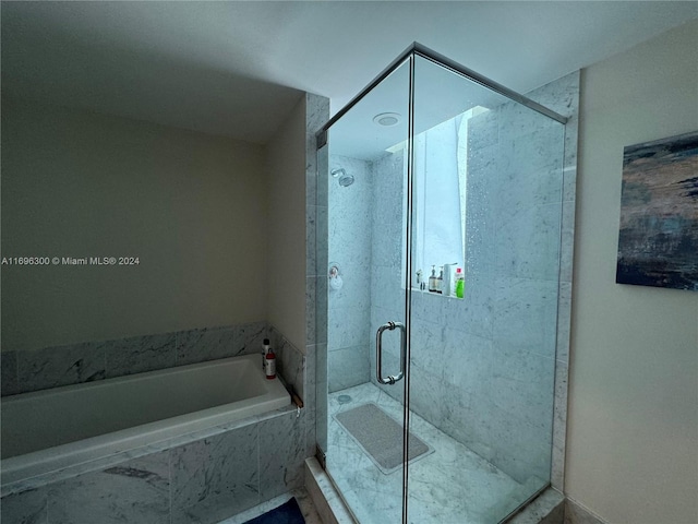 bathroom with independent shower and bath