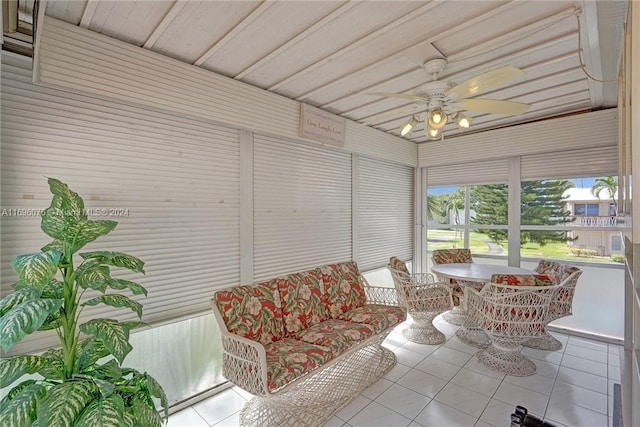 sunroom / solarium with ceiling fan