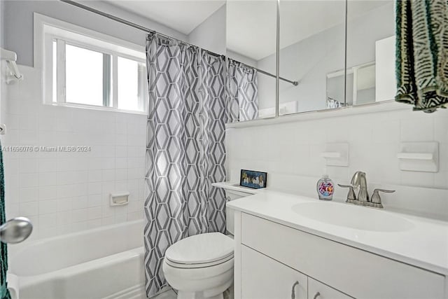 full bathroom featuring backsplash, vanity, shower / bath combo with shower curtain, tile walls, and toilet