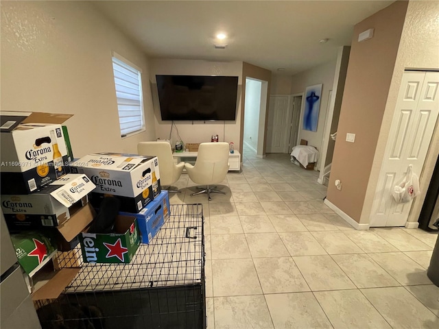 living room featuring light tile patterned flooring