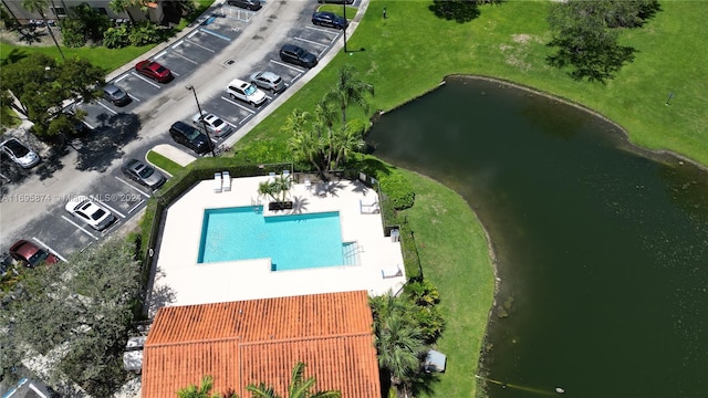 drone / aerial view with a water view