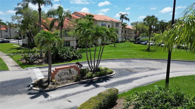 view of community featuring a yard