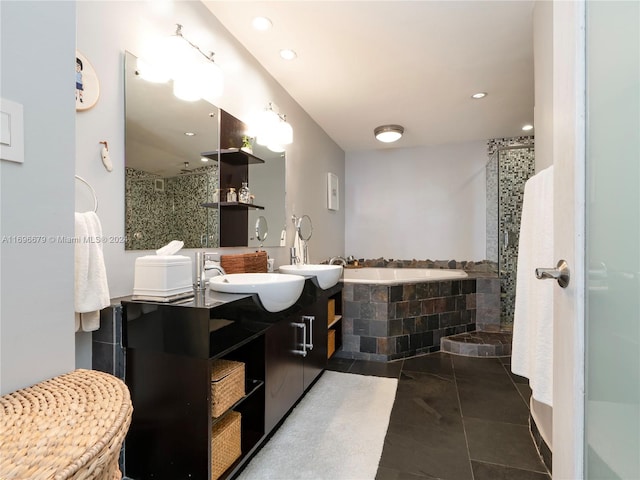 bathroom with tile patterned floors, vanity, tile walls, and plus walk in shower