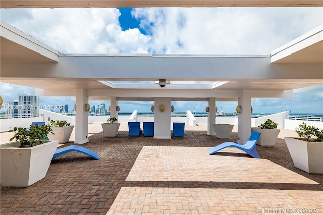 view of patio / terrace with a water view