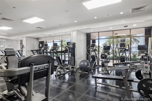 exercise room with ornamental molding