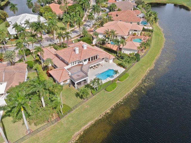 drone / aerial view with a water view