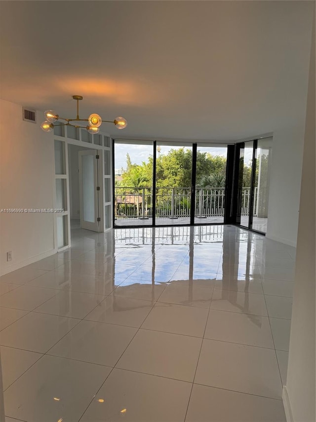 empty room with light tile patterned flooring