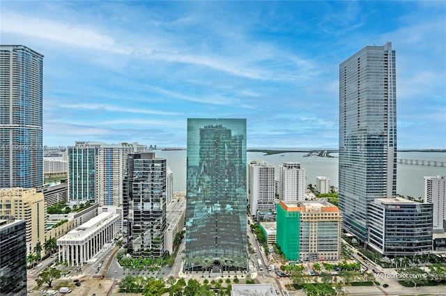 property's view of city featuring a water view